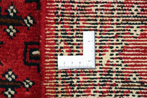 Close-up detail of 2000s Torkaman rug from Iran / Persia showing Wool weave