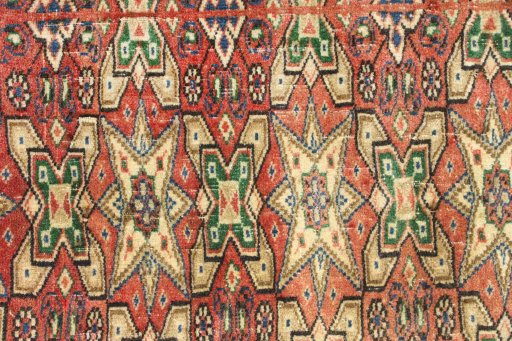 Close-up detail of 1990s Torkaman rug from Iran / Persia showing Wool weave