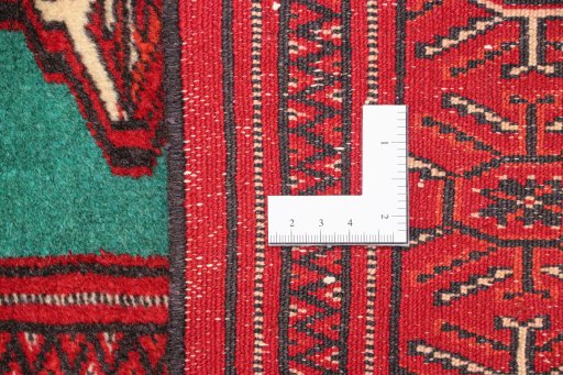 Corner detail of 1990s Torkaman rug showing border pattern and Wool pile