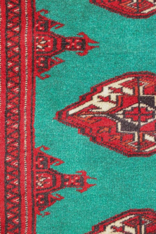 Close-up detail of 1990s Torkaman rug from Iran / Persia showing Wool weave