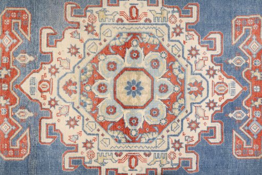 Backside of handmade 1920s Wiss rug showing knot structure and weave density