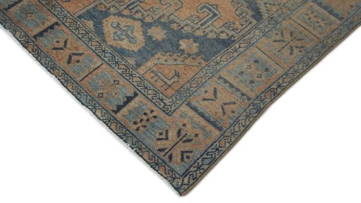 Backside of handmade 1940s Wiss rug showing knot structure and weave density