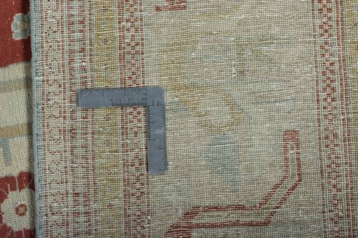 Backside of handmade 1950s Wiss rug showing knot structure and weave density