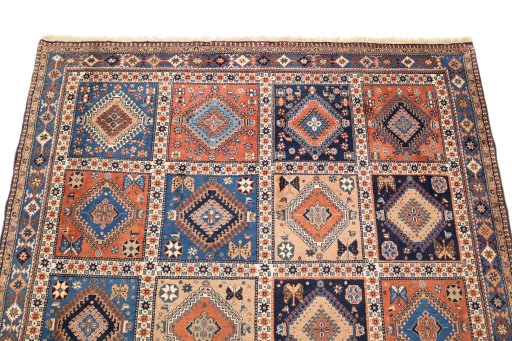 Surface texture of 1990s Yalameh rug with natural Wool and intricate pattern