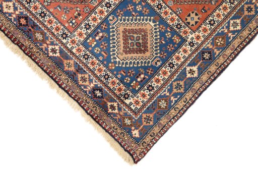 Backside of handmade 1990s Yalameh rug showing knot structure and weave density