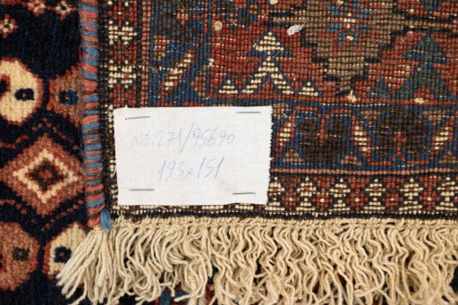 Corner detail of 1990s Yalameh rug showing border pattern and Wool pile