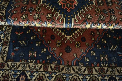 Full view of 2000s Yalameh rug from Iran / Persia, 152 × 108 cm in Red tones
