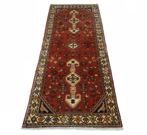 Surface texture of 2000s Yalameh rug with natural Wool and intricate pattern