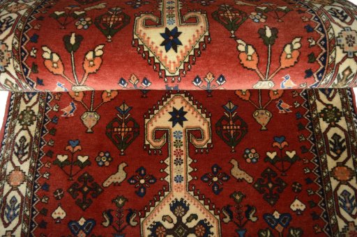 Full view of 2000s Yalameh rug from Iran / Persia, 213 × 79 cm in Red tones