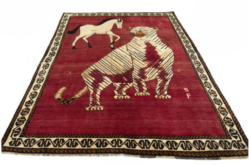Surface texture of 2000s Yalameh rug with natural Wool and intricate pattern