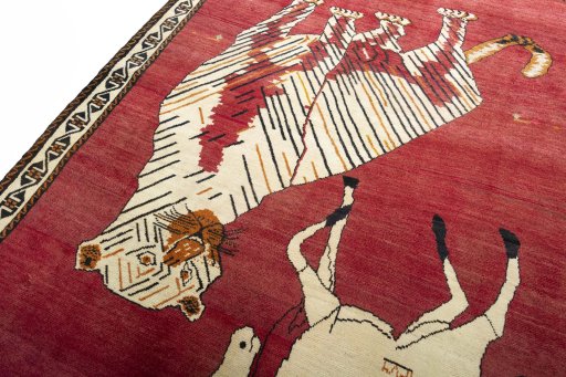 Backside of handmade 2000s Yalameh rug showing knot structure and weave density