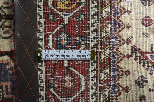 Close-up detail of 2000s Yalameh rug from Iran / Persia showing Wool weave