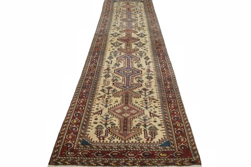 Surface texture of 2000s Yalameh rug with natural Wool and intricate pattern