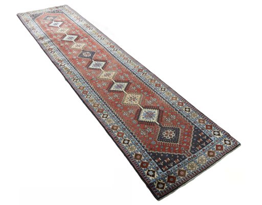 Close-up detail of 2000s Yalameh rug from Iran / Persia showing Wool weave