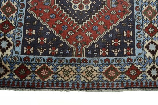 Central medallion detail of 2000s Yalameh rug from Iran / Persia