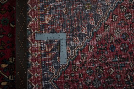 Corner detail of 2000s Yalameh rug showing border pattern and Wool pile
