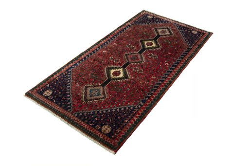 Corner detail of 2000s Yalameh rug showing border pattern and Wool pile
