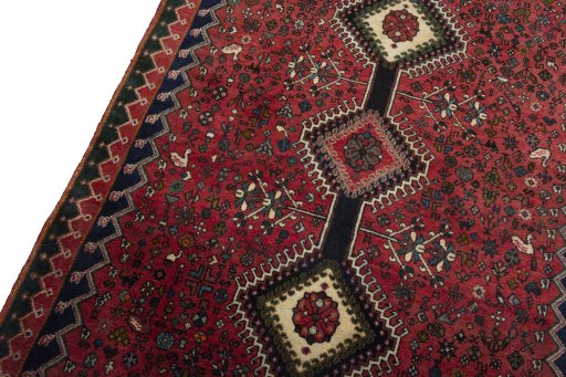 Backside of handmade 2000s Yalameh rug showing knot structure and weave density