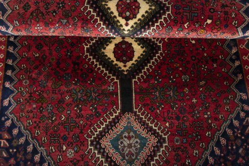 Full view of 2000s Yalameh rug from Iran / Persia, 225 × 113 cm in Red tones