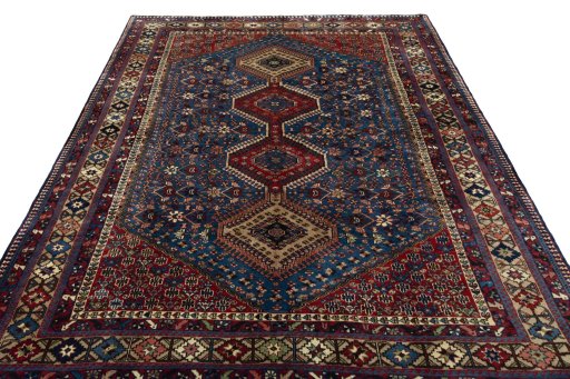 Surface texture of 1970s Yalameh rug with natural Wool and intricate pattern