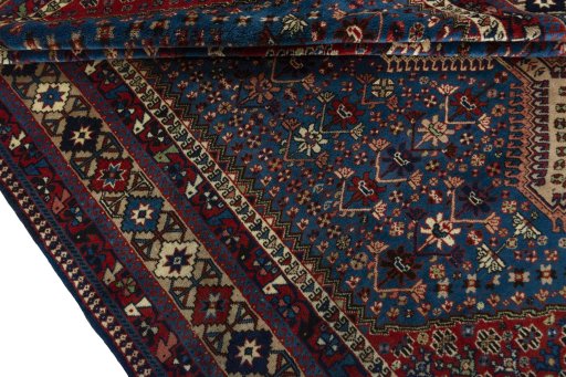 Full view of 1970s Yalameh rug from Iran / Persia, 296 × 220 cm in Blue tones