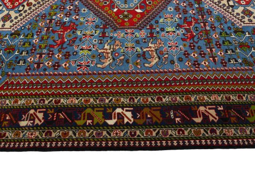 Corner detail of 1970s Yalameh rug showing border pattern and Wool pile