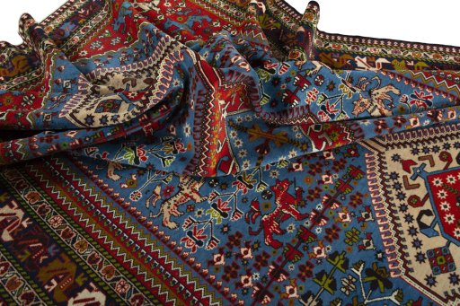 Surface texture of 1970s Yalameh rug with natural Wool and intricate pattern