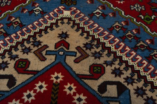 Central medallion detail of 1970s Yalameh rug from Iran / Persia