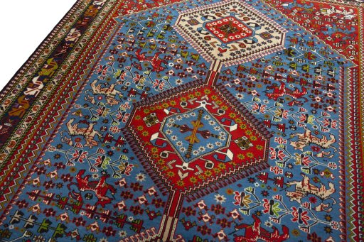 Backside of handmade 1970s Yalameh rug showing knot structure and weave density