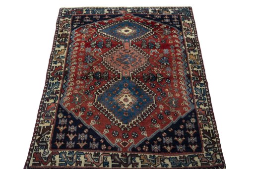 Surface texture of 1970s Yalameh rug with natural Wool and intricate pattern