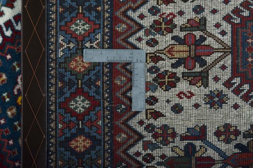 Close-up detail of 2000s Yalameh rug from Iran / Persia showing Wool weave