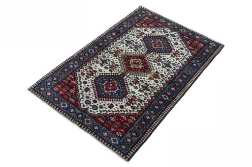 Corner detail of 2000s Yalameh rug showing border pattern and Wool pile