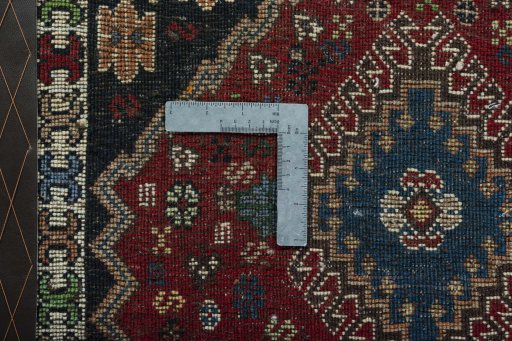 Corner detail of 2000s Yalameh rug showing border pattern and Wool pile