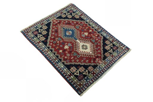 Close-up detail of 2000s Yalameh rug from Iran / Persia showing Wool weave