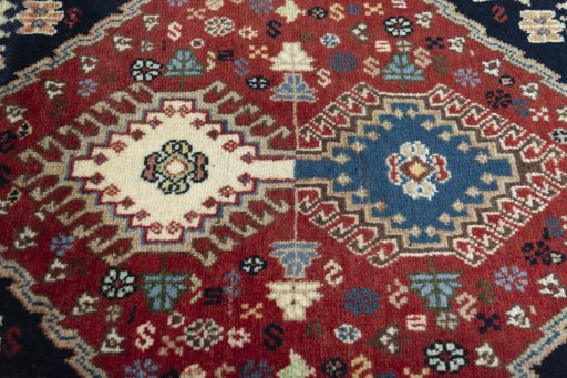 Central medallion detail of 2000s Yalameh rug from Iran / Persia