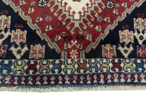 Close-up detail of 2000s Yalameh rug from Iran / Persia showing Wool weave