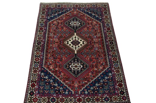 Surface texture of 2000s Yalameh rug with natural Wool and intricate pattern