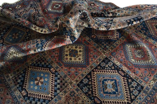 Corner detail of 2000s Yalameh rug showing border pattern and Wool pile