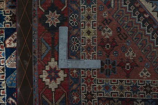 Close-up detail of 2000s Yalameh rug from Iran / Persia showing Wool weave
