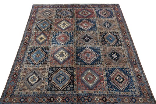 Surface texture of 2000s Yalameh rug with natural Wool and intricate pattern