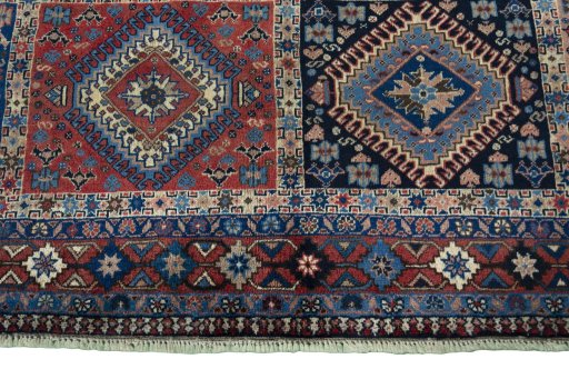 Central medallion detail of 2000s Yalameh rug from Iran / Persia