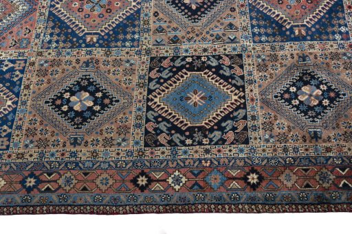 Close-up detail of 2000s Yalameh rug from Iran / Persia showing Wool weave