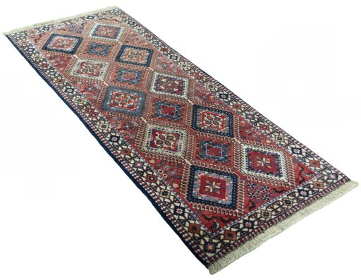 Close-up detail of 2000s Yalameh rug from Iran / Persia showing Wool weave