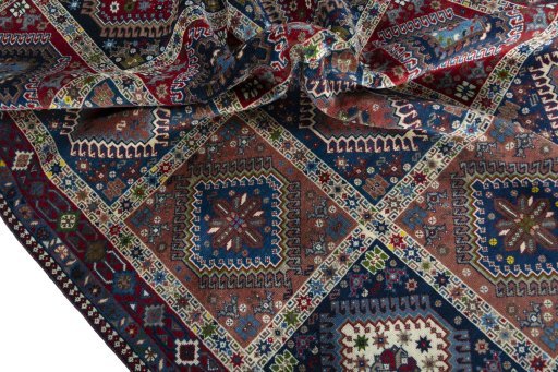 Corner detail of 2000s Yalameh rug showing border pattern and Wool pile
