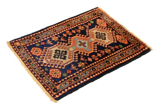 Corner detail of 1990s Yalameh rug showing border pattern and Wool pile