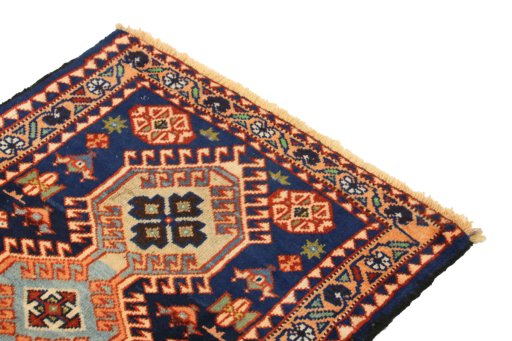 Surface texture of 1990s Yalameh rug with natural Wool and intricate pattern