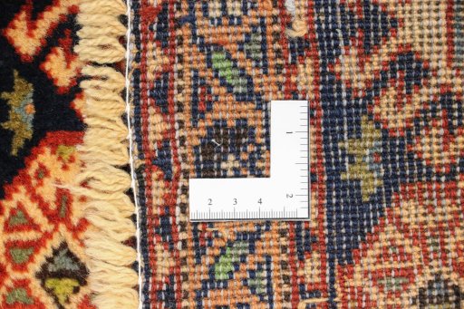 Close-up detail of 1990s Yalameh rug from Iran / Persia showing Wool weave