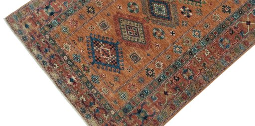 Backside of handmade New Kazak rug showing knot structure and weave density