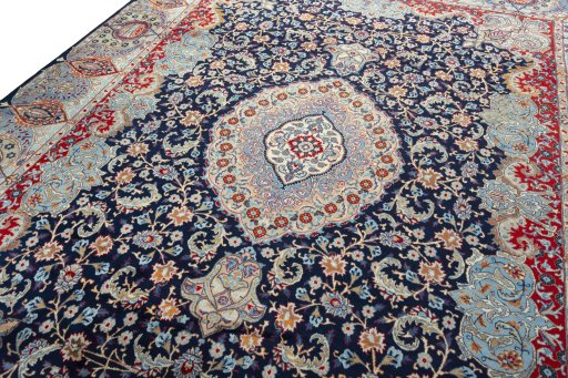 Backside of handmade 1970s Kashmar rug showing knot structure and weave density