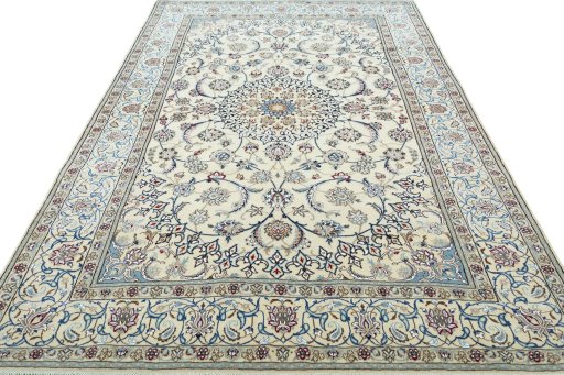 Surface texture of 2000s Nain rug with natural Wool and intricate pattern